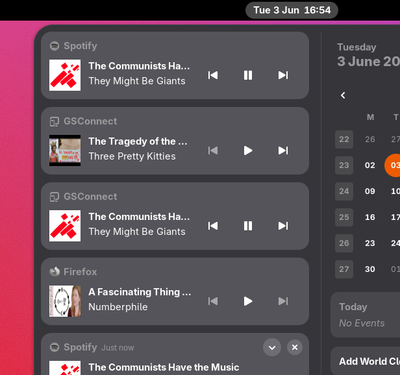 GNOME notification menu showing notifications and media players with media controls. Four media players are shown.